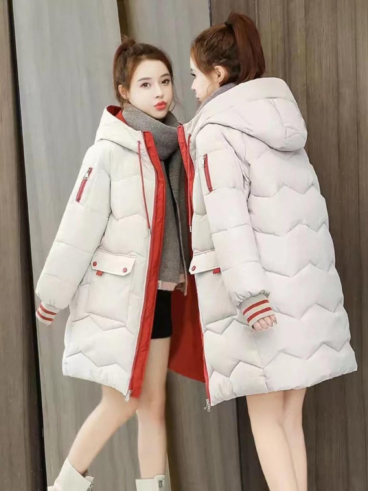 Damen Winterjacke mit verstellbarer Kapuze und klarer Linienführung