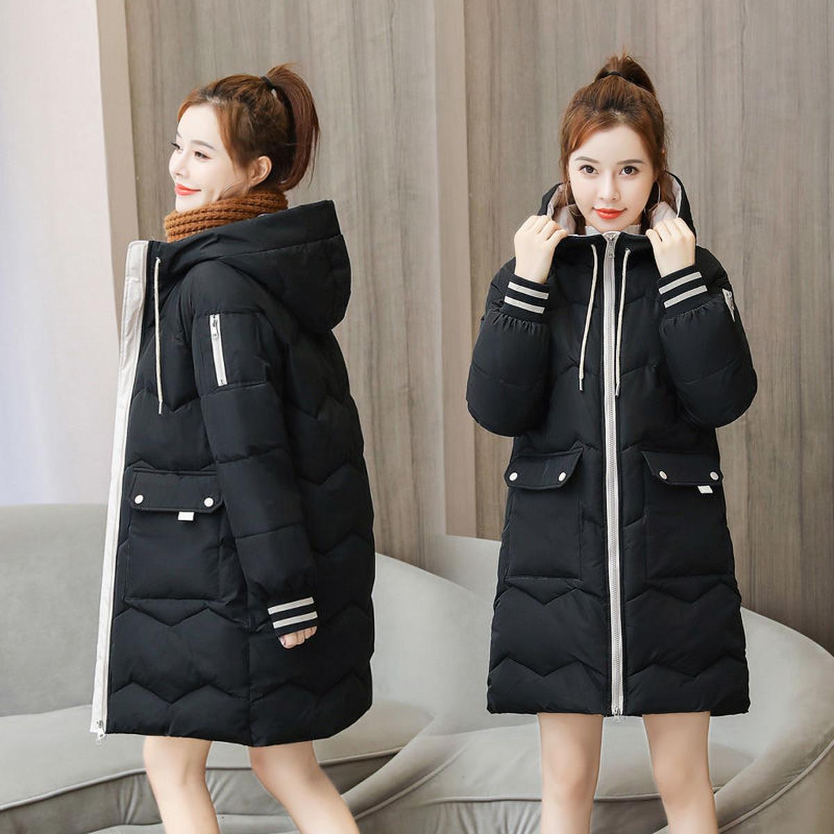 Damen Winterjacke mit verstellbarer Kapuze und klarer Linienführung