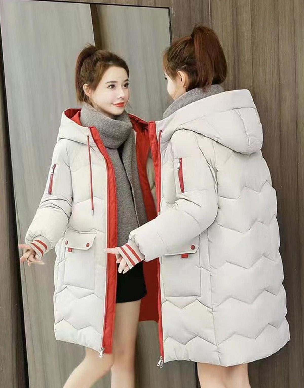 Damen Winterjacke mit verstellbarer Kapuze und klarer Linienführung